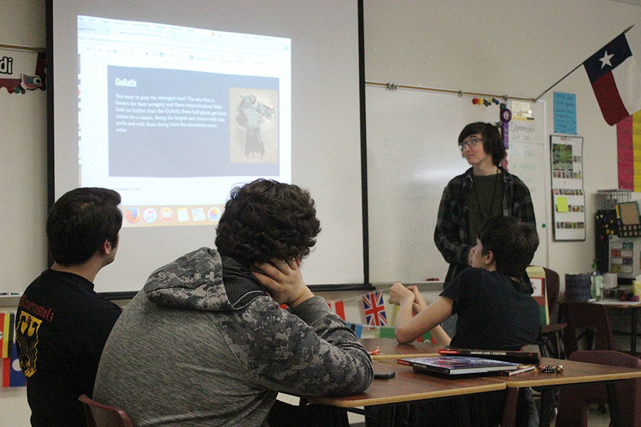 Senior club president Leo Ferary speaks to new members about Dungeons & Dragons during the club meeting on Wednesday, March 27.
