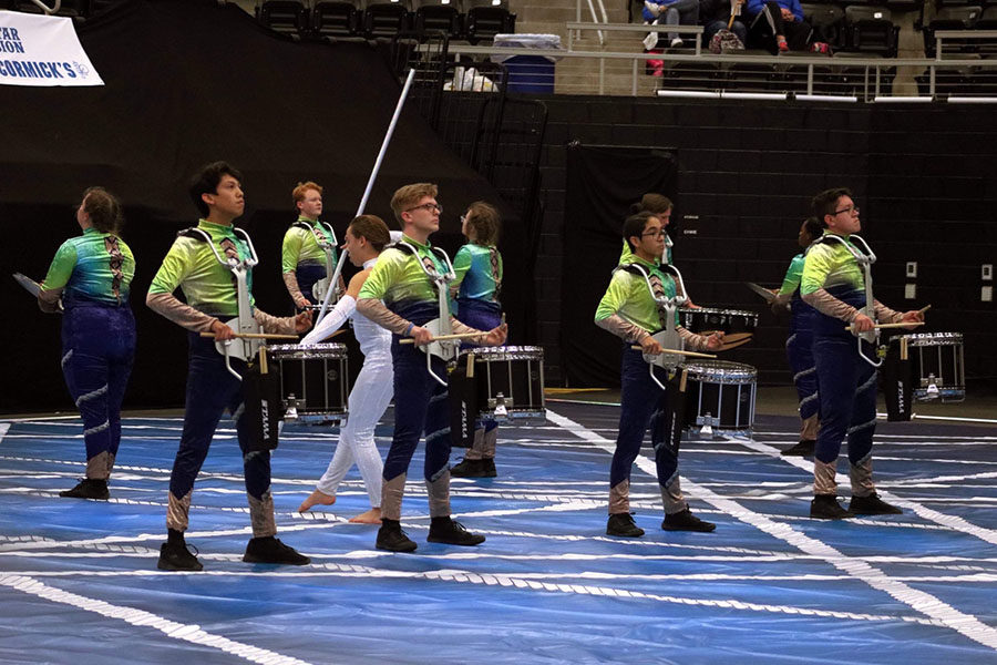 The drumline performs their show, Balancing Act, at the Winter Guard International competition on Saturday, March 2. Courtesy of the Lewisville Band Booster club.