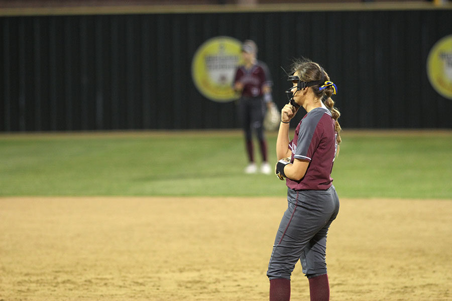 Senior Haven Grider (5) waits to pitch the ball.