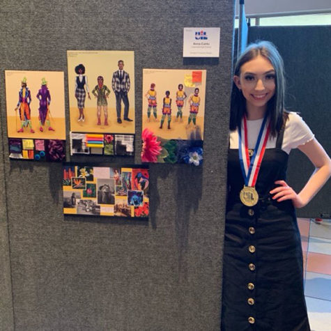 Senior Anna Cantu stands next to her first place theatrical design work. Courtesy of Laura McNary.