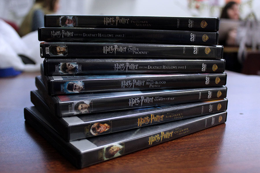 The Harry Potter movies lay stacked on a table in order of their ranking.