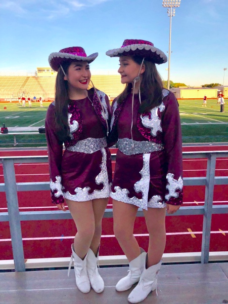 Sloane and Brantley Ibanez pose for a photo in their Farmerette uniforms. Courtesy of Sloan Ibanez.