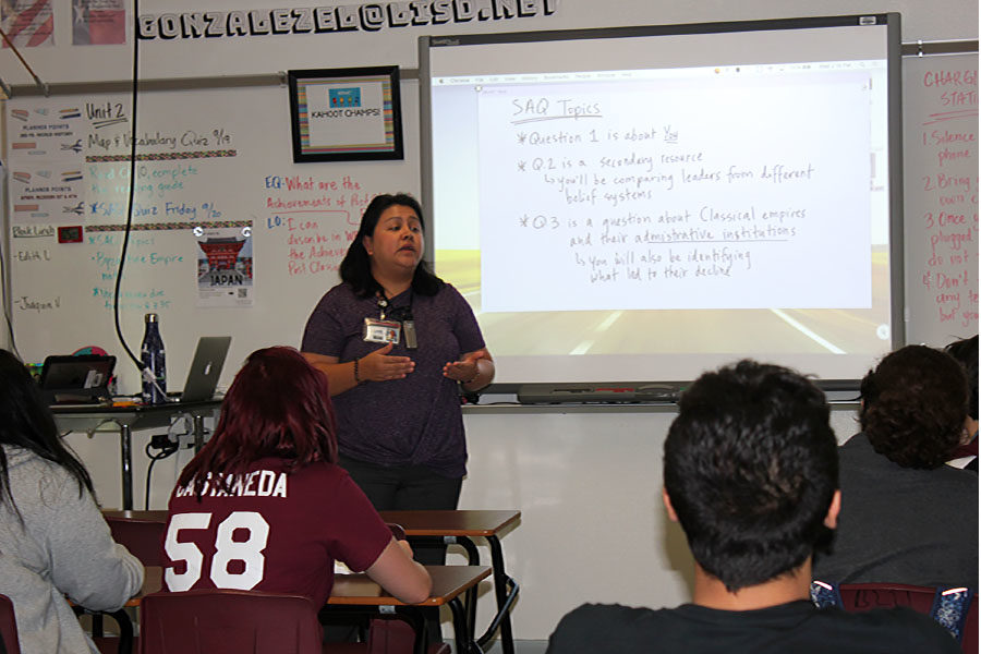 AP world history teacher Elizabeth Gonzalez talks about the short answer question (SAQ) on Wednesday, Sept. 18 during fourth period.