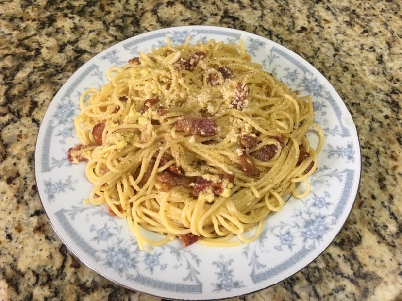 A plate of Spaghetti Carbonara cooked by senior Erick Nguyen sits ready to eat.
