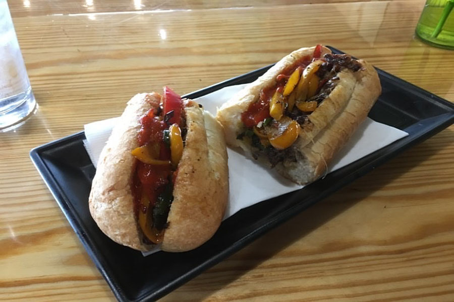 Philly cheesesteak with sautéed bell peppers are cooked and prepared by senior Erick Nguyen.