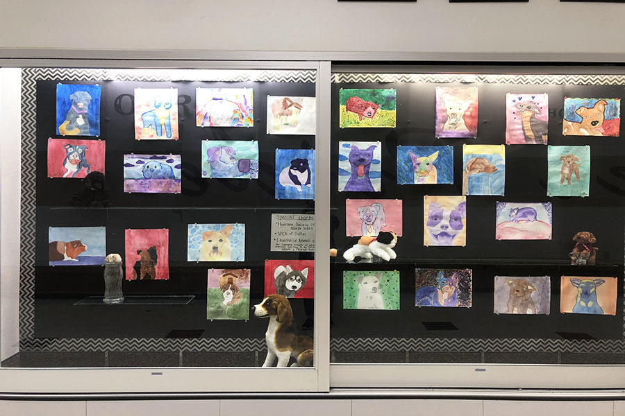 Students watercolor projects are located in a display case at Killough.