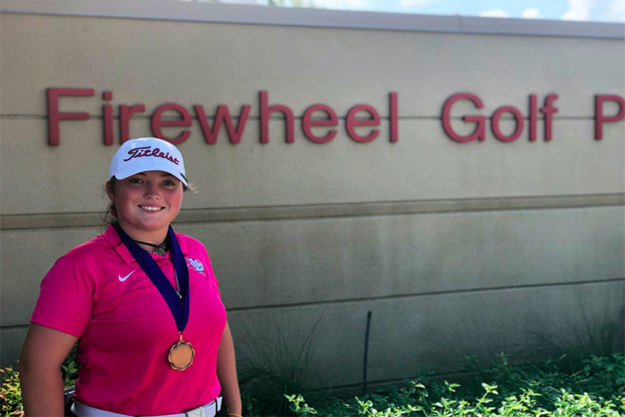 Junior Ashlee Johnson wins third place on Thursday, Oct. 3 at the Firewheel Pink Out tournament. Courtesy of Julie Lowrey.