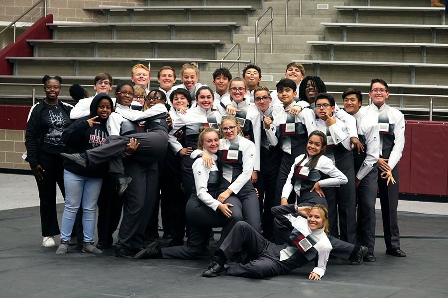 Drumline+members+pose+after+their+host+competition+on+Saturday%2C+Nov.+9.