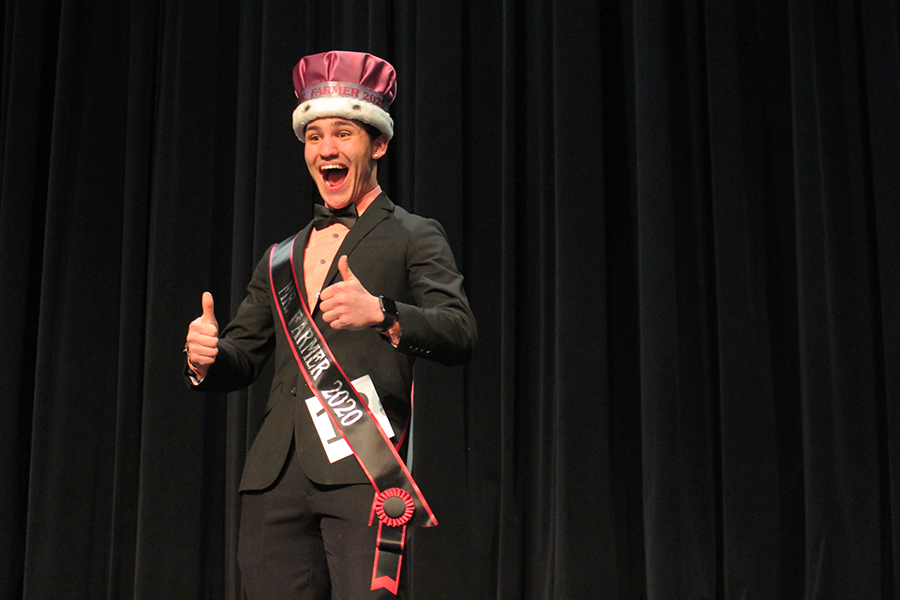 First place winner of Mr. Farmer senior Jimmy Piraino poses with a thumbs up after being crowned. 