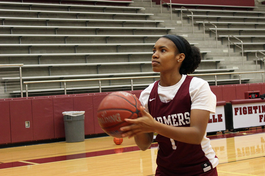 Senior Shantel Biscette prepares for a free throw during first period practice on Thursday, Dec. 10.