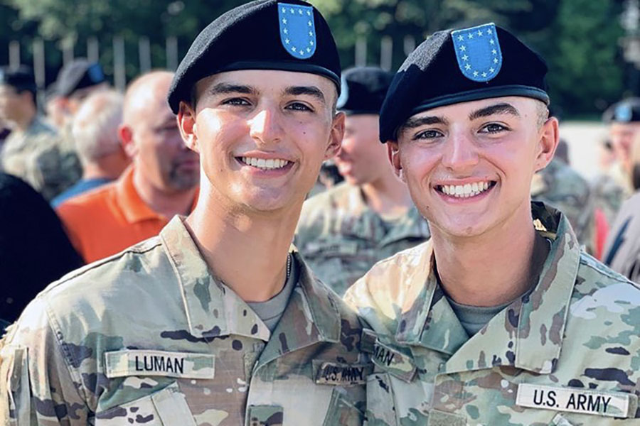 Seniors Luke and Landon Luman celebrate after basic training during the summer of 2019 in Fort Benning, Georgia.