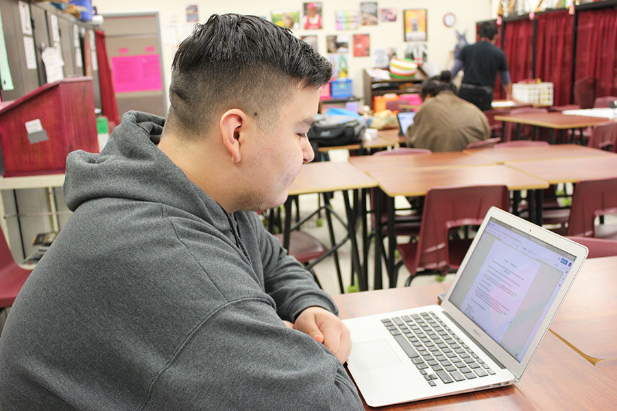 Junior Bryant Hernandez memorizes his poem on Friday, Nov. 1 during block lunch in preparation for Poetry Out Loud tryouts.