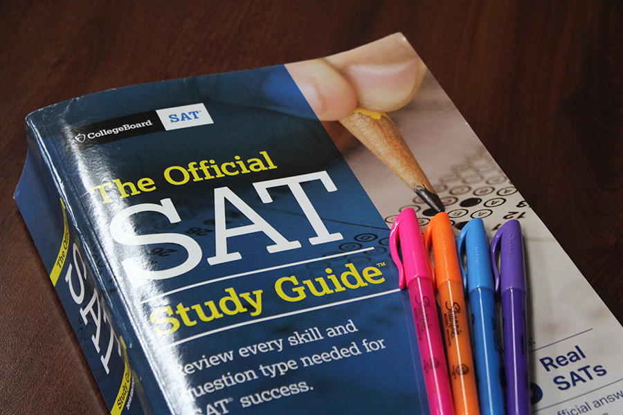 Students use SAT study books to prepare for the PSAT and SAT.