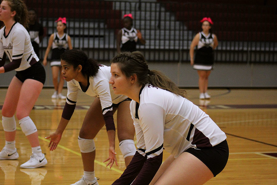 Senior Bruna Leao watches the ball as it is served by the other team.