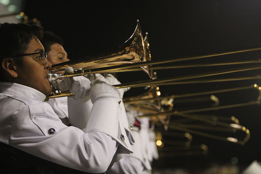 Trombone+players+cheer+on+the+football+team+from+the+bleachers+during+the+homecoming+game+on+Friday%2C+Oct.+22.