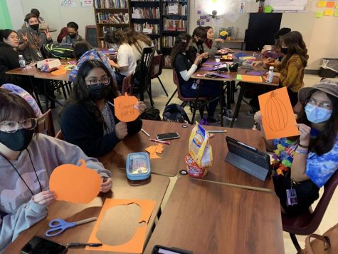 Students create Halloween cards for the elderly in the Letters for Rose club.