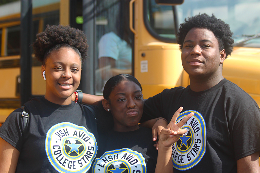After a 30 minute bus ride, sophomores Cerynaty Smith, QuenNiya Robinson and Roman Grant are ready to start their last AVID field trip of the year.