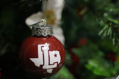 School Christmas ornaments are for sale for $3 at the Farmers Trading Post.
