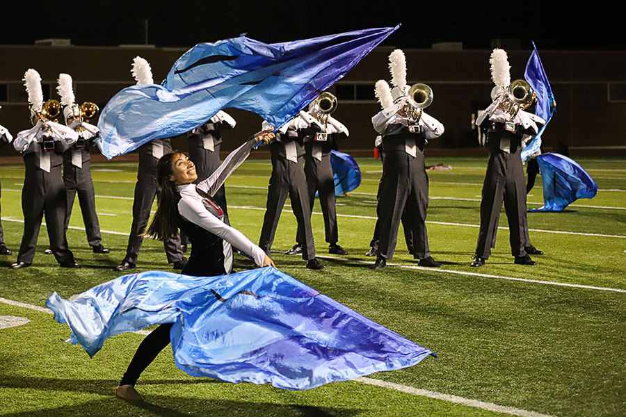 Band and colorguard perform their UIL competition routine during halftime at Battle of the Axe.