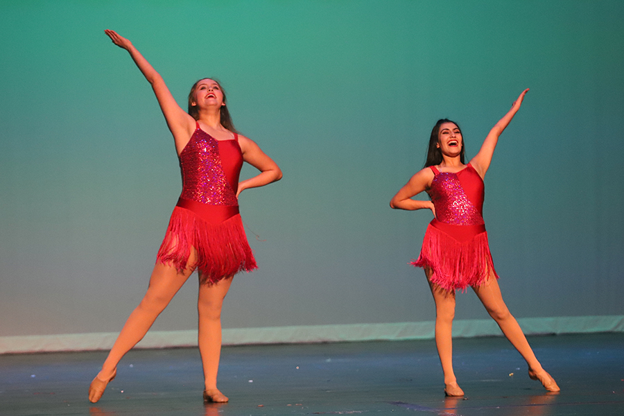 Junior lieutenant Bella Ortega, alongside her group, perform Christmas Dance as the third dance of the 2022 Holiday Show on Dec. 2. Santa, Can’t You Hear Me was the opening performance of Friday night.