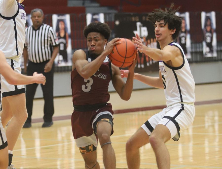 Senior Trelin Green (3) prepares to pass the ball during the game against Frisco Independence on Dec. 1.