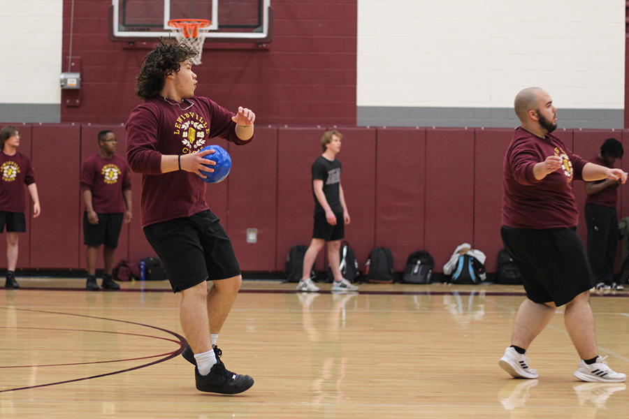 Junior Hector Urdiales plays on the team Choir Nerds in the first round of the dodgeball match in the B gym. 