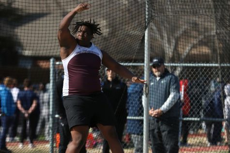 After spinning three times, junior Devin Love throws the discus at the Flower Mound invitational.