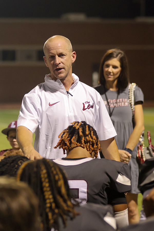 Head football coach Michael Odle delivers a speech after the game on Friday, Aug. 25.  