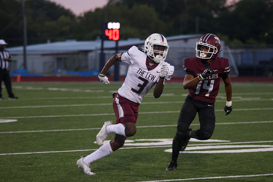 Senior wide receiver Tye Miller (3) runs his route against Skeeters cornerback Loyd McIntosh (14) in the first quarter of the away game against Mesquite. 