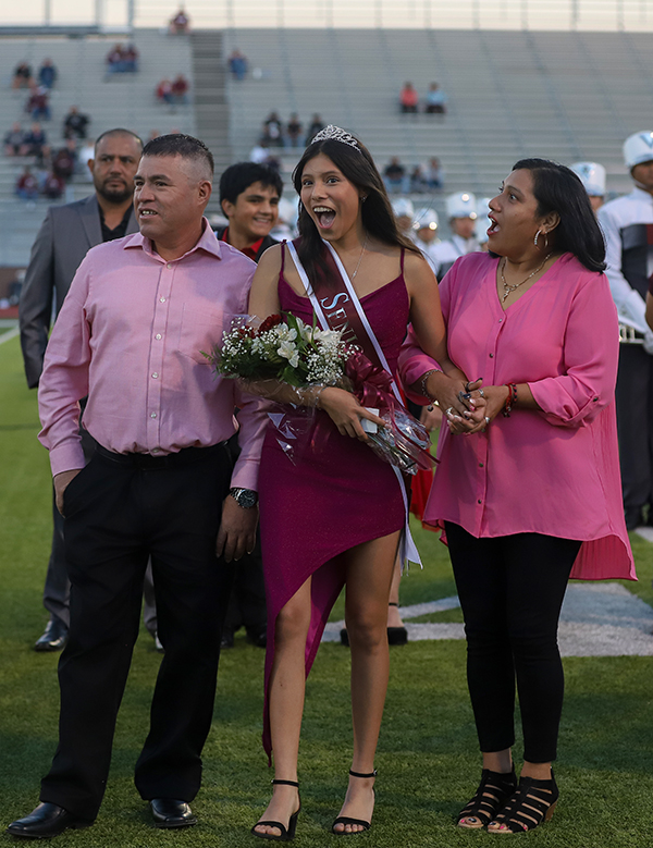 Senior student body president Tiara Rebollar wins homecoming queen at the homecoming game Friday, Oct. 13. Rebollar was accompanied by her mother and father as its announced she won the crown.