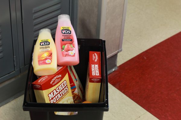 A donation bin sits outside of Interact sponsor Blake Hollowells room in E111 for people to drop off their donations.
