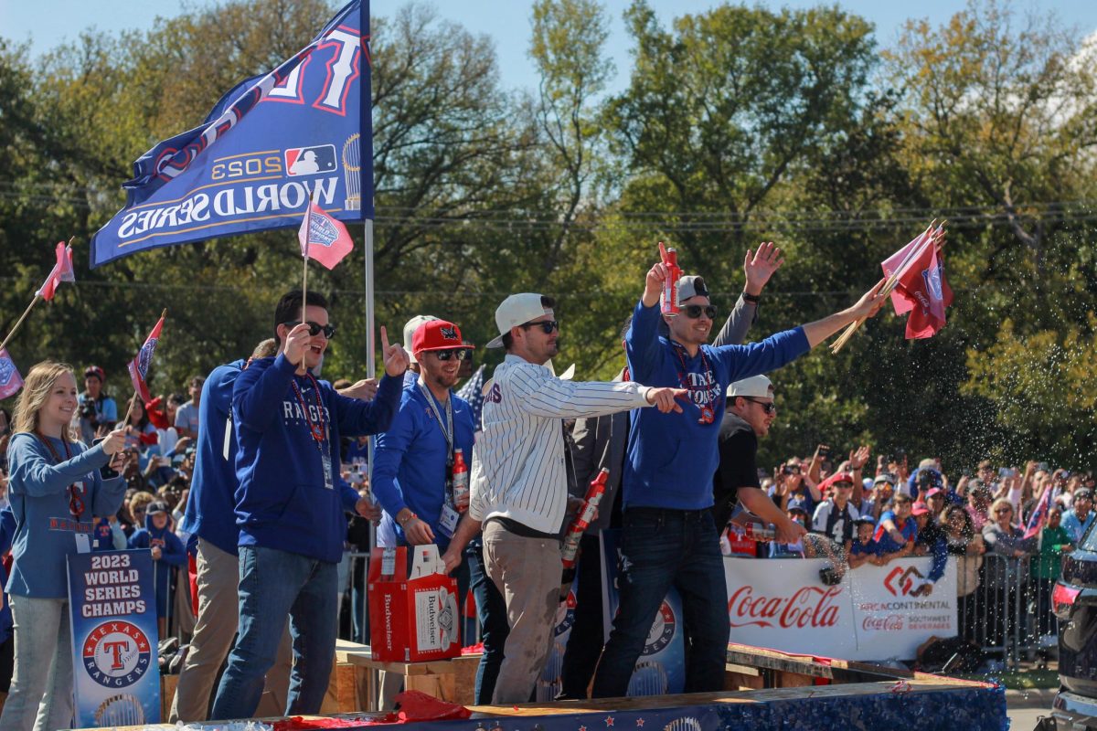Texas Rangers field staffers celebrate on a float during the teams World Series championship parade on Friday, Nov. 3.