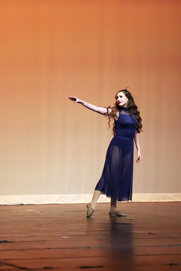 Farmerette captain Katherine Gore performs a contemporary routine to By Christmas Eve during the holiday show.