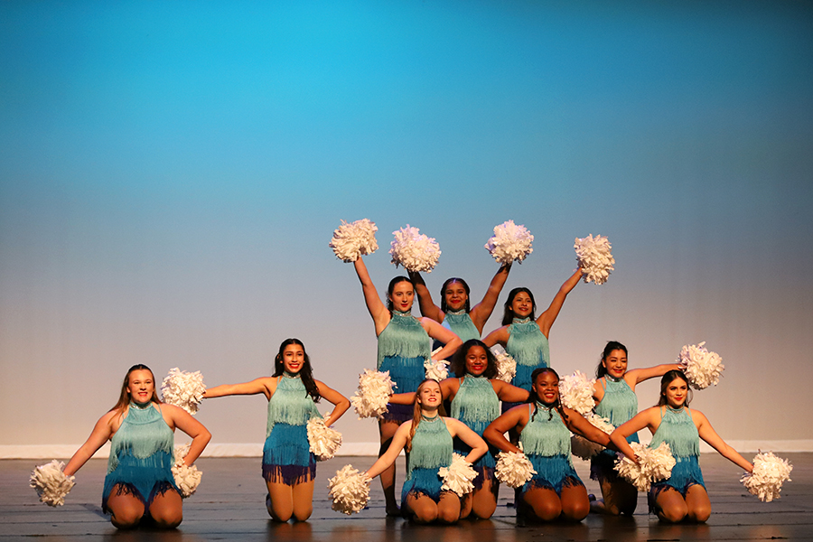 Junior varsity Farmerettes perform a pom performance to Last Christmas during the holiday show. 