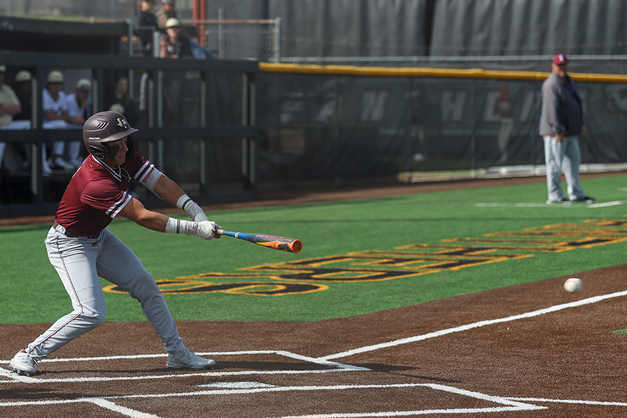 Junior Jacob Gallegos hits a foul ball in a game against Plano East on Friday, March 15. 