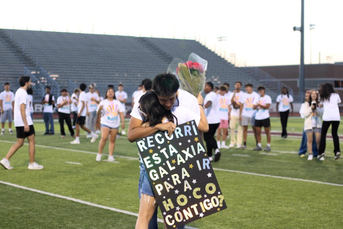 Senior Joshua Salas surprises senior Guadalupe Luna with a Homecoming proposal.