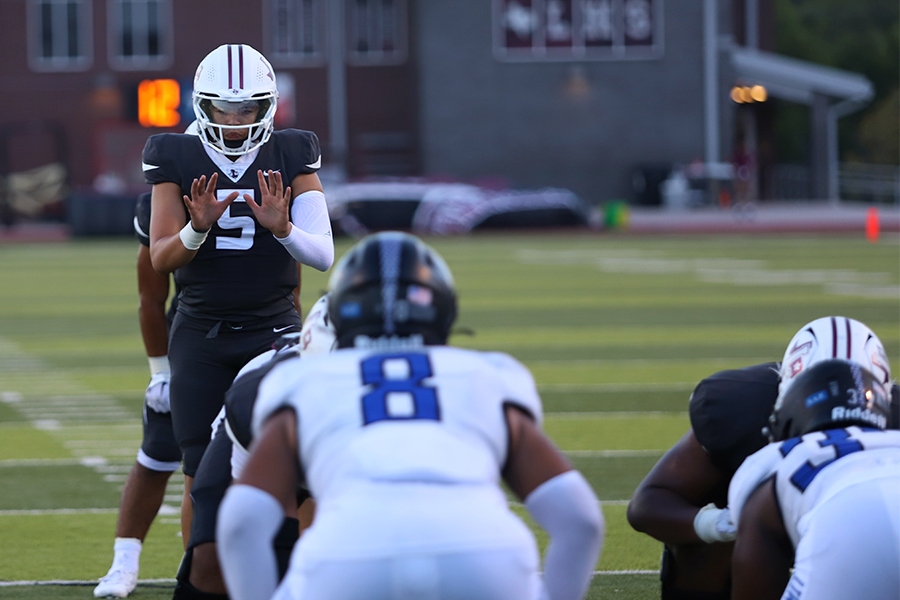 Quarterback Tre Williams prepares for the snap near the goal line. 