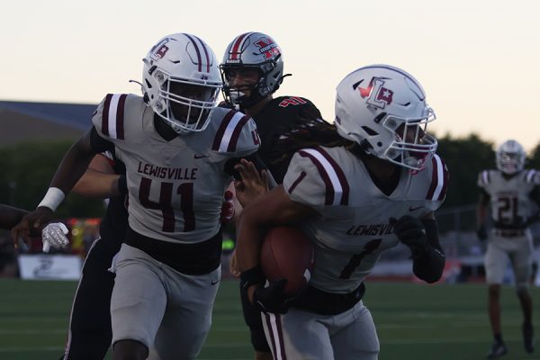 Junior Gabe Webb and senior D'Angelo King run the ball during the BOTA game on Friday, Sept. 27. The Farmers won the game 27-21 in overtime.