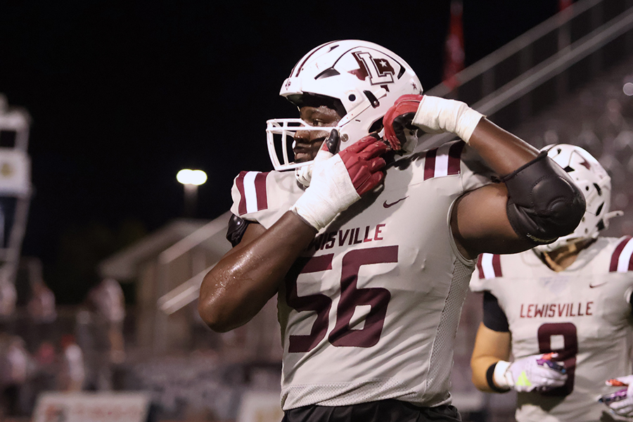 Senior Michael Fasusi adjusts his helmet during the BOTA game on Friday, Sept. 27.