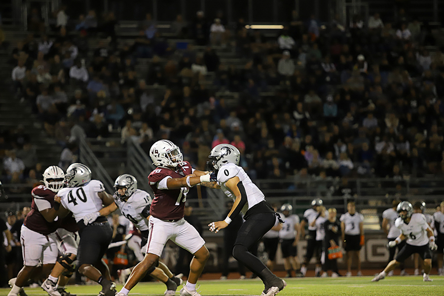 Sophomore wide receiver Deontae Weathers blocks a Denton Guyer defender.