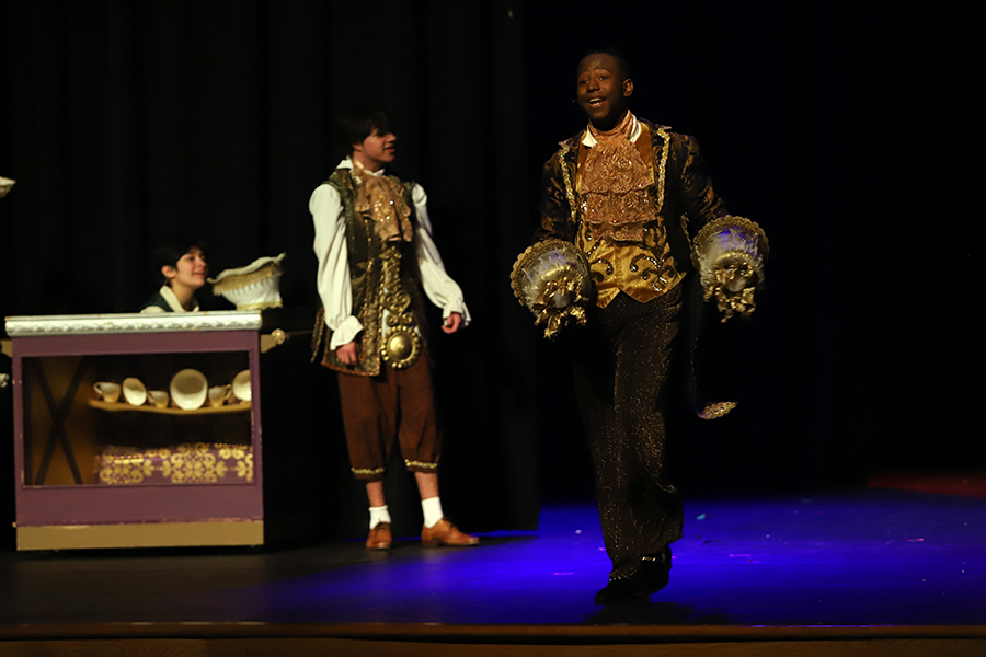 Sophomore Chris Bowers plays Lumière in Beauty and the Beast.