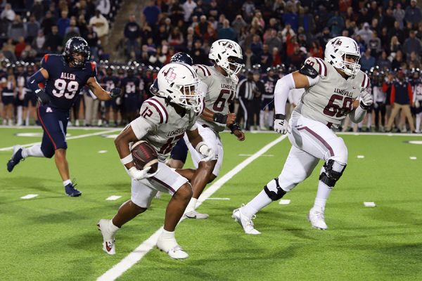 Junior running back Tenel Hill bolts downfield in the Allen game on Friday, Nov. 15.