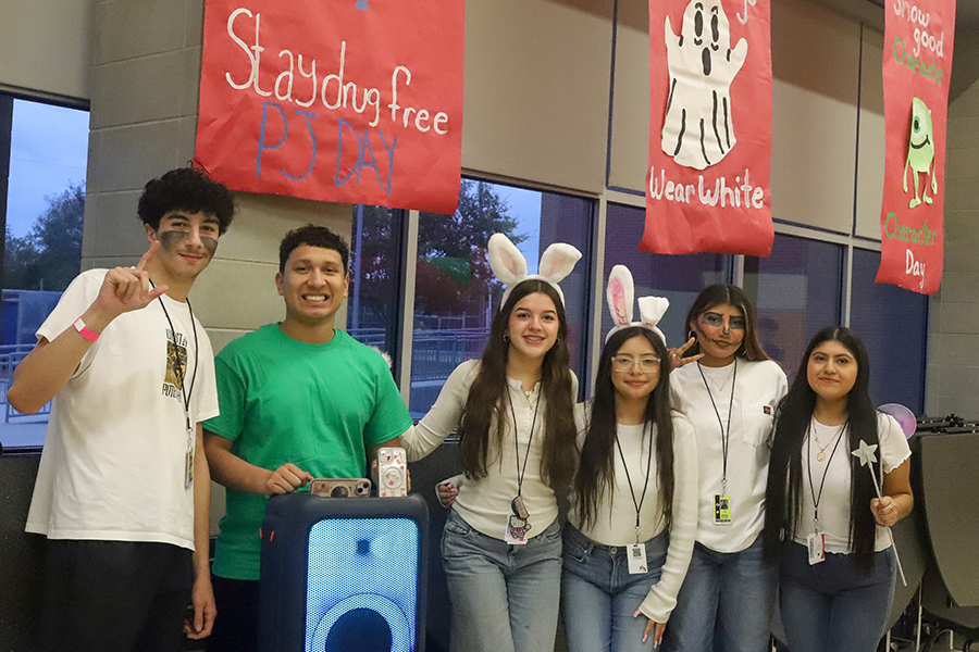 Senior class officers volunteer for their bounce house booth.