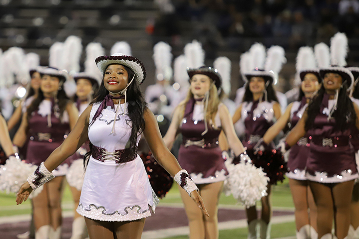  Farmerettes perform during half time at the football game. 