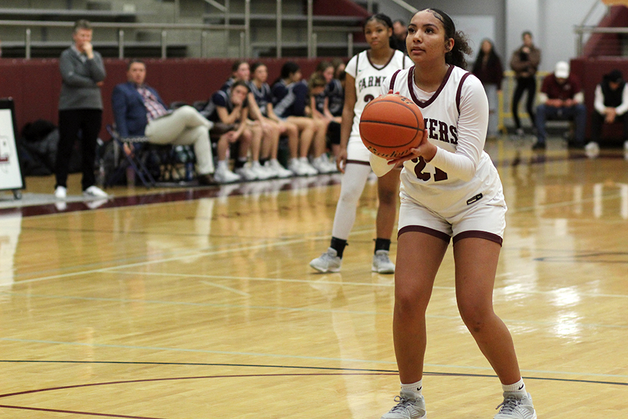 Guard Torrin Johnson prepares a free throw vs Flower Mound