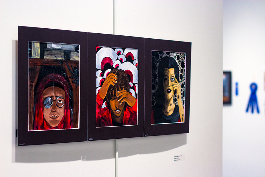 Senior Jakelyn Lopez's 'Phobias Triptych' utilized acrylic and India ink. 