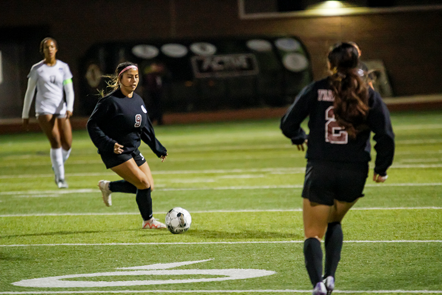 Senior Sofia Flores dribble the ball vs Hebron on Feb. 4