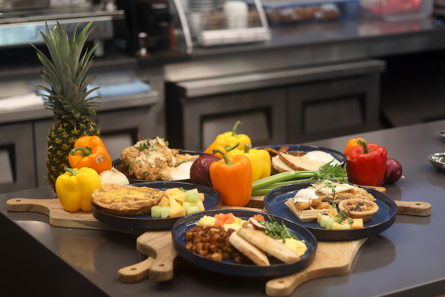A breakfast demo is displayed on the cafe counter for customers to see the entrees offered.