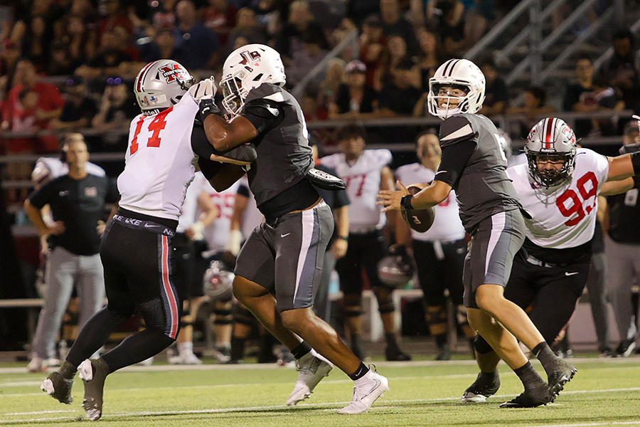 Junior Alan Williams looks for an open receiver to send the ball to. 