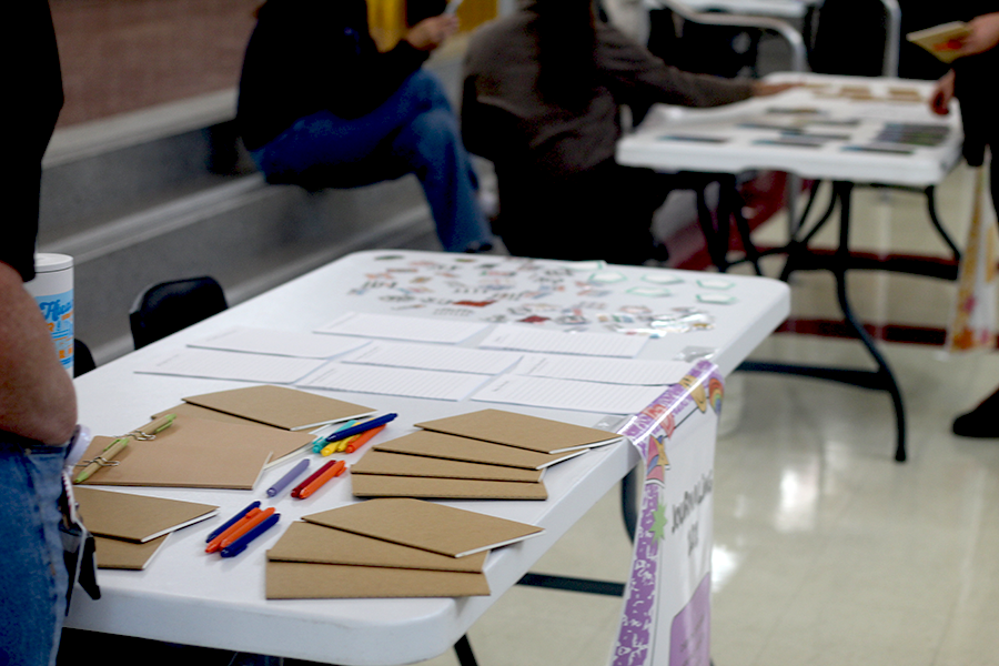 The journaling table is set with supplies to help students cope by journaling